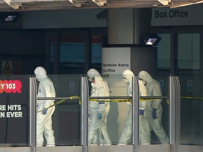 MANCHESTER, ENGLAND - MAY 23: Police forensic officers leave the Manchester Arena as they investigate the scene of an explosion on May 23, 2017 in Manchester, England. An explosion occurred at Manchester Arena as concert goers were leaving the venue after Ariana Grande had performed. Greater Manchester Police are treating the explosion as a terrorist attack and have confirmed 22 fatalities and 59 injured. (Photo by Dave Thompson/Getty Images)