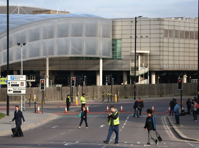 MANCHESTER, ENGLAND - MAY 23: Members of the public make their way to work on May 23, 2017 in Manchester, England. An explosion occurred at Manchester Arena as concert goers were leaving the venue after Ariana Grande had performed. Greater Manchester Police are treating the explosion as a terrorist attack and have confirmed 22 fatalities and 59 injured. (Photo by Dave Thompson/Getty Images)
