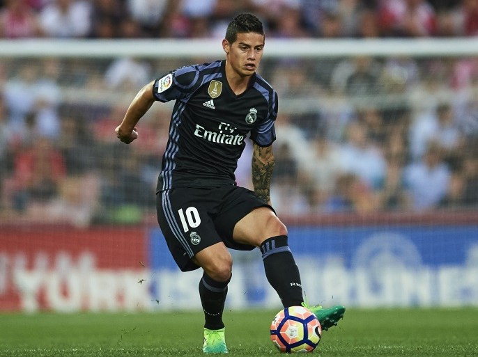 GRANADA, SPAIN - MAY 06: James Rodriguez of Real Madrid CF in action during the La Liga match between Granada CF v Real Madrid CF at Estadio Nuevo Los Carmenes on May 6, 2017 in Granada, Spain. (Photo by Aitor Alcalde/Getty Images)