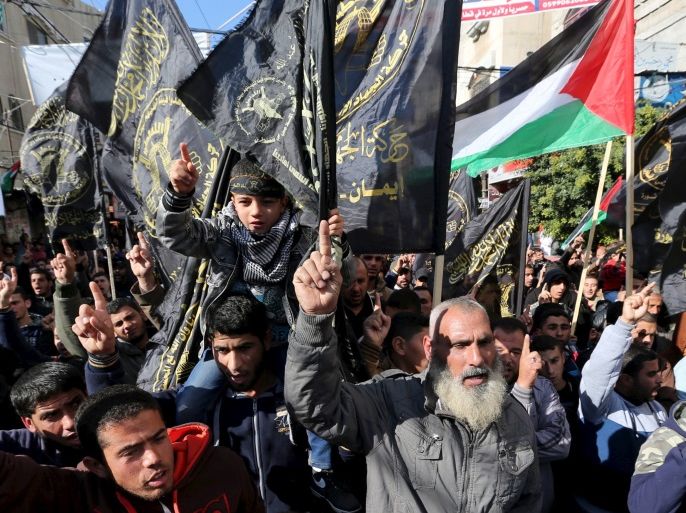 Palestinians take part in a rally organized by Islamic Jihad in Rafah in the southern Gaza Strip December 18, 2015, in support of what organizers said is a Palestinian uprising against Israel. REUTERS/Ibraheem Abu Mustafat