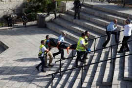 ATTENTION EDITORS - VISUAL COVERAGE OF SCENES OF INJURY OR DEATH Israeli security and emergency personnel remove the body of a Palestinian woman whom an Israeli police spokesperson said attempted a stabbing attack at Damascus Gate, in Jerusalem's Old City March 29, 2017. REUTERS/Baz Ratner