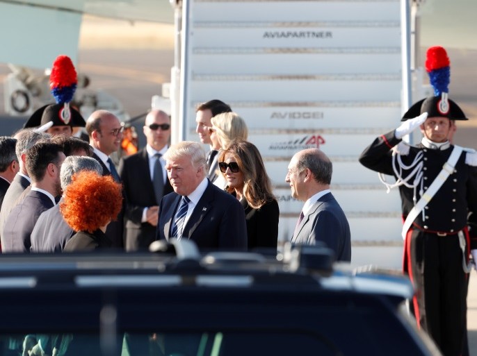 U.S. President Donald Trump and first lady Melania Trump are greeted by Italian Foreign Minister Angelino Alfano (R) at the Leonardo da Vinci-Fiumicino Airport in Rome, Italy, May 23, 2017. REUTERS/Remo Casilli