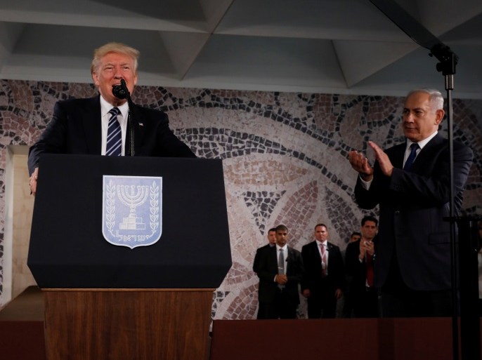 U.S. President Donald Trump (L), flanked by Israel's Prime Minister Benjamin Netanyahu (R), arrives to deliver remarks at the Israel Museum in Jerusalem May 23, 2017. REUTERS/Jonathan Ernst TPX IMAGES OF THE DAY