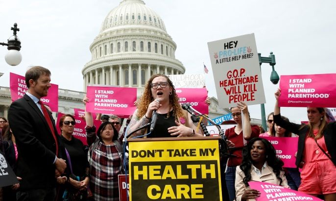 Protesters rally during U.S. House voting on the American Health Care Act, which repeals major parts of the 2000 Affordable Care Act know as Obamacare on Capitol Hill in Washington, U.S., May 4, 2017. REUTERS/Yuri Gripas
