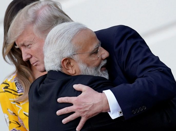 India's Prime Minister Narendra Modi hugs U.S. President Donald Trump as he departures the White House after a visit, in Washington, U.S., June 26, 2017. REUTERS/Carlos Barria