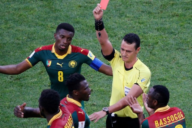 Soccer Football - Germany v Cameroon - FIFA Confederations Cup Russia 2017 - Group B - Fisht Stadium, Sochi, Russia - June 25, 2017 Cameroon’s Ernest Mabouka is shown a red card by referee Wilmar Roldan REUTERS/Grigory Dukor