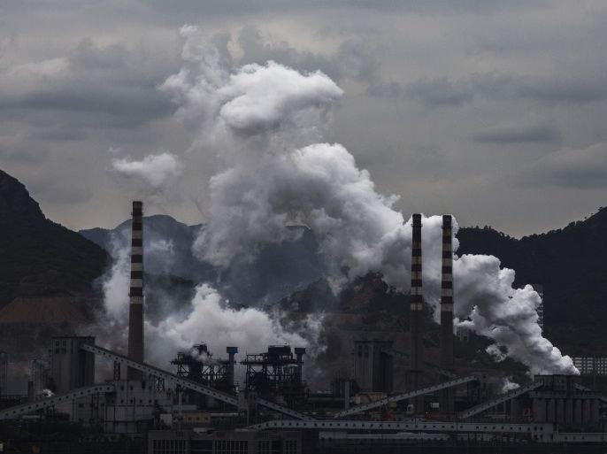 HEBEI, CHINA -JUNE 2: Smoke and steam billows from a Chinese state owned steel plant on June 2, 2017 in Hebei, China. China, the world's largest polluter, reaffirmed its commitment to the Paris Climate Accord Friday, after US President Donald Trump announced his intentions to withdraw the United States from the agreement on Thursday. (Photo by Kevin Frayer/Getty Images)