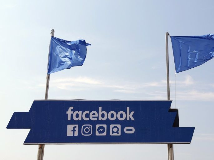The logo of the social network Facebook is seen on a beach during the Cannes Lions Festival in Cannes, France, June 21, 2017. REUTERS/Eric Gaillard