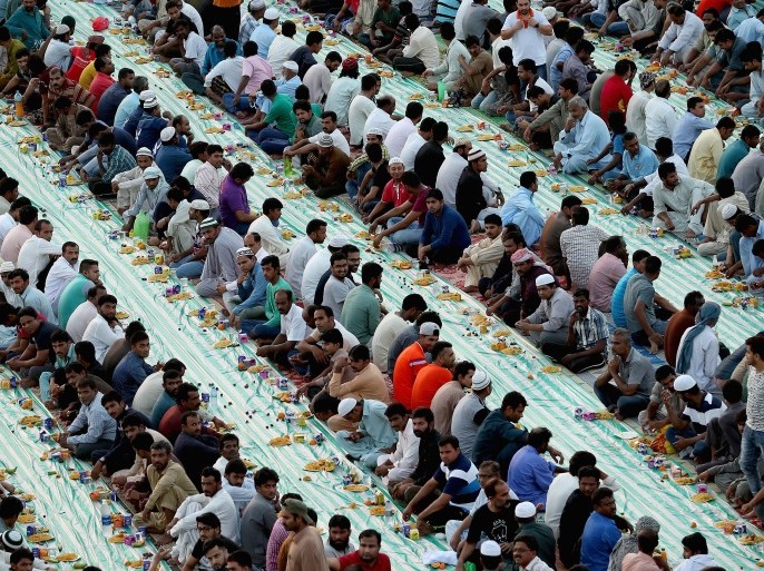 DUBAI, UNITED ARAB EMIRATES - MAY 29: Muslims break their fast with iftar during the holy month of Ramadan on May 29, 2017 in Dubai, United Arab Emirates. Muslim men and women across the world observe Ramadan, a month long celebration of self-purification and restraint. During Ramadan, the Muslim community fast, abstaining from food, drink, smoking and sex between sunrise and sunset, breaking their fast with an Iftar meal after sunset. (Photo by Francois Nel/Getty Images)
