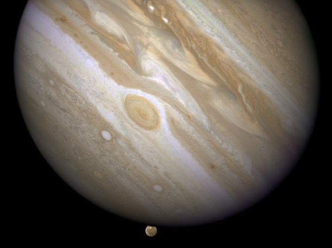 The planet Jupiter is shown with one of its moons, Ganymede (bottom), in this NASA handout taken April 9, 2007 and obtained by Reuters March 12, 2015. Scientists using the Hubble Space Telescope have confirmed that the Jupiter-orbiting moon Ganymede has an ocean beneath its icy surface, raising the prospects for life, NASA said on Thursday. REUTERS/NASA/ESA and E. Karkoschka/Handout via Reuters (OUTERSPACE - Tags: SCIENCE TECHNOLOGY) ATTENTION EDITORS - THIS PICTURE W