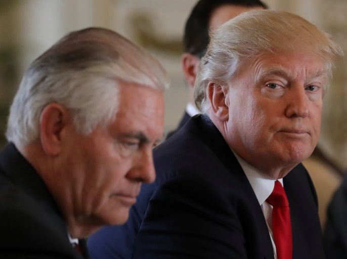 U.S. President Donald Trump (R) sits next to Secretary of State Rex Tillerson during a bilateral meeting with China's President Xi Jinping (Not Pictured) at Trump's Mar-a-Lago estate in Palm Beach, Florida, U.S., April 7, 2017. REUTERS/Carlos barria