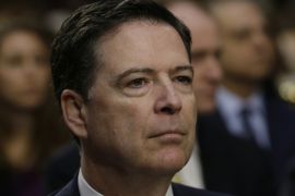 Former FBI Director James Comey testifies before a Senate Intelligence Committee hearing on
