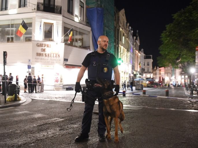 BRUSSELS, BELGIUM - JUNE 20: Armed police stand guard outside Brussels Central train station after a man triggered a small explosion inside the station on June 20, 2017 in Brussels, Belgium. The man was shot by soldiers inside the station and no-one else is believed to have been injured. The station and the city's Grand Place have since been evacuated with police stating the situation is now under control. 32 people died in attacks on Brussels claimed by the Islamic St