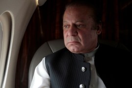 Pakistani Prime Minister Nawaz Sharif looks out the window of his plane after attending a ceremony to inaugurate the M9 motorway between Karachi and Hyderabad, Pakistan February 3, 2017. Picture taken February 3, 2017. REUTERS/Caren Firouz