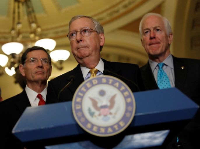 Senate Majority Leader Mitch McConnell, accompanied by Sen. Cory Gardner (R-CO), Sen. John Barrasso (R-WY) and Sen. John Cornyn (R-TX), speaks to the media following the weekly policy luncheons on Capitol Hill in Washington, D.C., U.S., June 6, 2017. REUTERS/Aaron P. Bernstein