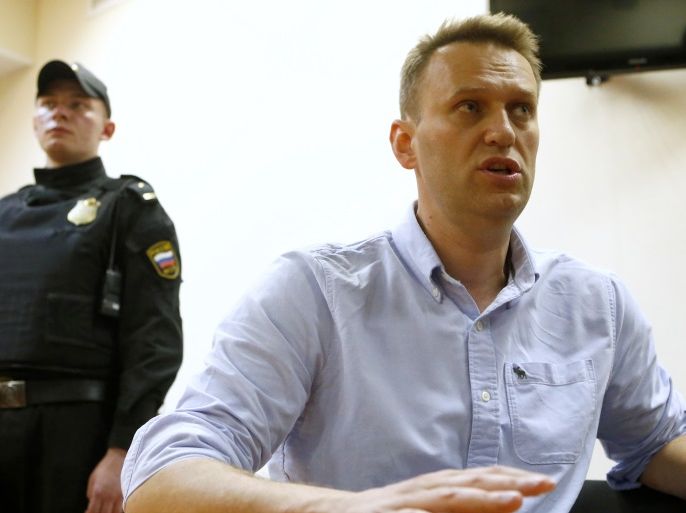 Russian opposition leader Alexei Navalny talks to journalists during a hearing at a court in Moscow, Russia, June 12, 2017. REUTERS/Sergei Karpukhin