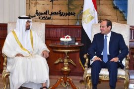 Egyptian President Abdel Fattah al-Sisi (R) speaks with Abu Dhabi Crown Prince Sheikh Mohammed bin Zayed al-Nahyan after he arrives with delegation members in Cairo, Egypt June 19, 2017 in this handout picture courtesy of the Egyptian Presidency. The Egyptian Presidency/Handout via REUTERS ATTENTION EDITORS - THIS IMAGE WAS PROVIDED BY A THIRD PARTY.