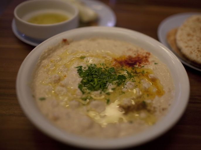 TEL AVIV, ISRAEL - OCTOBER 09: (ISRAEL OUT) A dish of hummus (chick peas) is seen at Abu Hassan restaurant on October 09, 2013 in Jaffa, a suburb of Tel Aviv, Israel. (Photo by Lior Mizrahi/Getty Images)