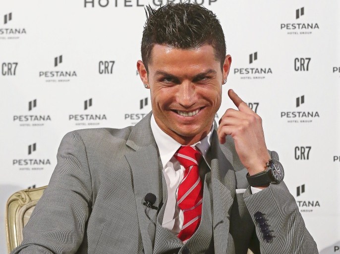 epa06025869 (FILE) Real Madrid's Portuguese striker Cristiano Ronaldo smiles during the presentation of an agreement with the Pestana Hotel Group, planning to build four hotels, at Pestana Palace Hotel in Lisbon, Portugal, 17 December 2015 (reissued 13 June 2017). The Spanish General Attorney announced on 13 June 2017 a formal complaint against Cristiano Ronaldo accusing him of 'consciously' creating a corporate structure for a tax fraud of 14.7 million euros, media reports claimed. EPA/JOSE SENA GOULAO
