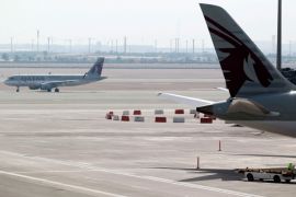 Qatar Airways aircrafts are seen at Hamad International Airport in Doha, Qatar, June 7, 2017. REUTERS/Naseem Zeitoon