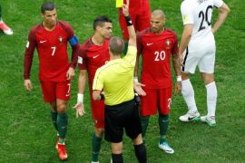 Soccer Football - New Zealand v Portugal - FIFA Confederations Cup Russia 2017 - Group A - Saint Petersburg Stadium, St. Petersburg, Russia - June 24, 2017 Portugal’s Pepe is shown a yellow card by referee Mark Geiger REUTERS/Carl Recine