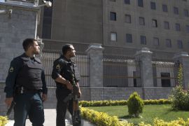 TEHRAN, IRAN - JUNE 7: Police officers stand outside Iran's parliament building following an attack by several gunmen on June 7, 2017 in Tehran, Iran. At least 12 people were killed and dozens more wounded during simultaneous gun and suicide bomb attacks in Iran's capital. A suicide bomber targeted the shrine of Ayatollah Ruhollah Khomeini while several gunmen launched an attack on the parliament building, which is now reportedly over following hours of audible gun-fire. (Photo by Majid Saeedi/Getty Images)