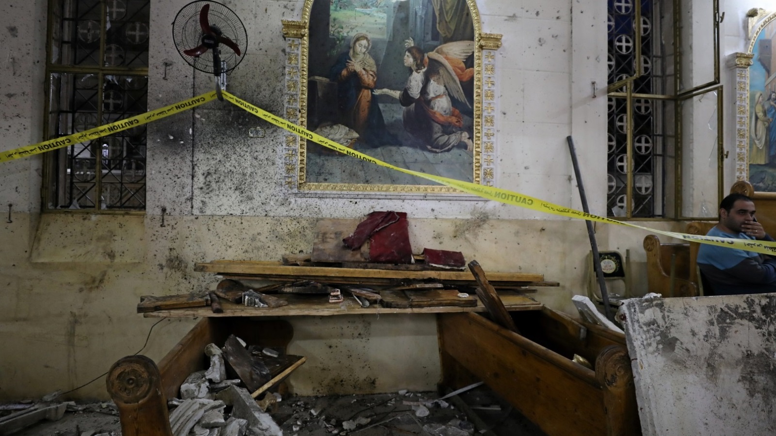 آثار التفجير الذي استهدف كنيسة مار جرجس في طنطا  (رويترز)