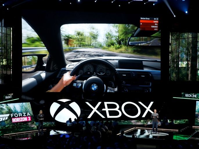 Ralph Fulton (R) presents Microsoft Xbox's Forza Horizon 3 at the Xbox E3 2016 media briefing in Los Angeles, California, U.S., June 13, 2016. REUTERS/Lucy Nicholson TPX IMAGES OF THE DAY