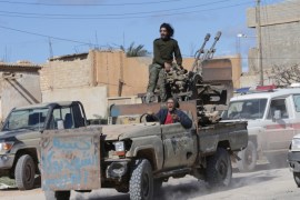 Members of East Libyan forces ride a vehicle after taking control of Ganfouda district in Benghazi, Libya January 26, 2017. REUTERS/Esam Omran Al-Fetori