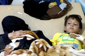 A boy and his mother, both infected with cholera, lie on a bed at a hospital in Sanaa, Yemen May 7, 2017. Picture taken May 7, 2017. REUTERS/Khaled Abdullah