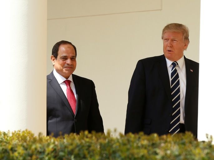 U.S. President Donald Trump and Egyptian President Abdel Fattah al-Sisi walk the colonnade at the White House in Washington, U.S., April 3, 2017. REUTERS/Kevin Lamarque