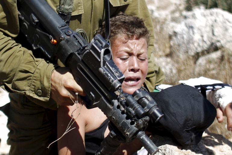 ميدان - إسرائيل احتلال جنود اعتقال طفل