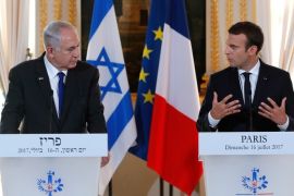 epa06091271 French President Emmanuel Macron and Israeli Prime Minister Benjamin Netanyahu attend a news conference to make a joint declaration at the Elysee Palace in Paris, France, 16 July 2017. Media reports state that Benjamin Netanyahu is visiting Paris to commemorate the victims of a mass arrest of Jews in Nazi-occupied France in 1942. More than 13,000 Jews arrested by French police on 16 and 17 July 1942. EPA/STEPHANE MAHE / POOL MAXPPP OUT