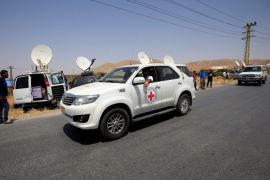 International Committee of the Red Cross (ICRC) car is seen in Labwe, at the entrance of the border town of Arsal, in eastern Bekaa Valley, Lebanon July 21, 2017. REUTERS/Ali Hashisho