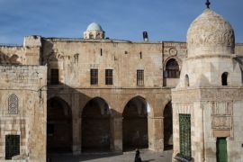 JERUSALEM, ISRAEL - JANUARY 17: A woman walks through the Al-Aqsa mosque compound in the Old City on January 17, 2017 in Jerusalem, Israel. 70 countries attended the recent Paris Peace Summit and called on Israel and Palestinians to resume negotiations that would lead to a two-state solution, however the recent proposal by U.S President-elect Donald Trump to move the US embassy from Tel Aviv to Jerusalem and last month's U.N. Security Council resolution condemning Jewi