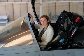French Minister of the Armed Forces Florence Parly poses as she sits in a Rafale jet fighter at an airbase in Jordan July 18, 2017. Picture taken July 18, 2017. REUTERS/Philippe Wojazer