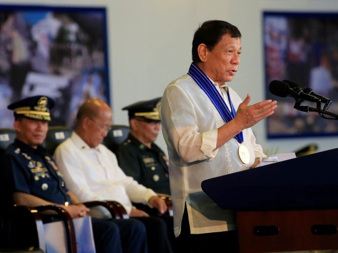 Philippines President Rodrigo Duterte gestures as he delivers a speech during the 70th Philippine Air Force (PAF) anniversary at Clark Air Base in Angeles city north of Manila, Pampanga province, Philippines July 4, 2017. REUTERS/Romeo Ranoco