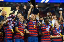 Jul 26, 2017; Santa Clara, CA, USA; United States midfielder Michael Bradley (5) hoists the trophy as he celebrates with teammates after defeating Jamaica during the CONCACAF Gold Cup final at Levi's Stadium. Mandatory Credit: Mark J. Rebilas-USA TODAY Sports