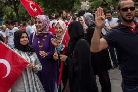 ISTANBUL, TURKEY - JULY 14: People are seen holding Turkish flags during a rally to honour the victims of the July 15, 2016 coup attempt aa day head of the first anniversary of the failed coup attempt on July 14, 2017 in Istanbul, Turkey. July 15, 2017 will mark the first anniversary of the failed coup attempt which saw 249 people die when military personnel attempted to over throw the government and President Recep Tayyip Erdogan. Extensive commemorations have been planned for the July 15 anniversary and the day has been declared an annual holiday. (Photo by Chris McGrath/Getty Images)