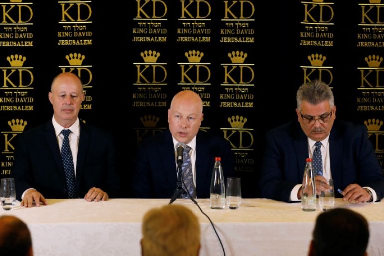 Jason Greenblatt (C), U.S. President Donald Trump's Middle East envoy, sits next to Tzachi Hanegbi (L), Israeli Minister of Regional Cooperation and Mazen Ghoneim, head of the Palestinian Water Authority, during a news conference in Jerusalem July 13, 2017. REUTERS/Ronen Zvulun