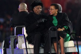 JOHANNESBURG, SOUTH AFRICA - JULY 11: Former President of South Africa Nelson Mandela and his wife Graca Machel arrive ahead of the 2010 FIFA World Cup South Africa Final match between Netherlands and Spain at Soccer City Stadium on July 11, 2010 in Johannesburg, South Africa. (Photo by Clive Rose/Getty Images)