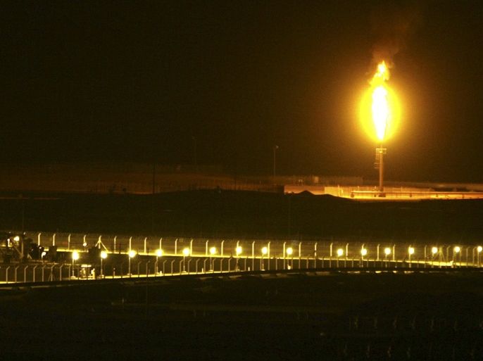 Shaybah oilfield complex is seen at night in the Rub' al-Khali desert, Saudi Arabia, November 14, 2007. REUTERS/Ali Jarekji/File Photo