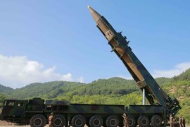 north Korean inter-continental ballistic rocket being prepared before a test launch