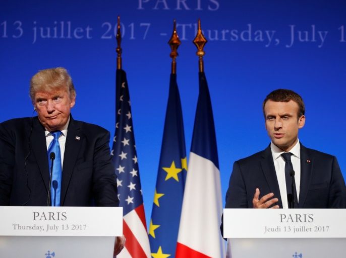 French President Emmanuel Macron and U.S. President Donald Trump attend a joint news conference at the Elysee Palace in Paris, France, July 13, 2017. REUTERS/Kevin Lamarque