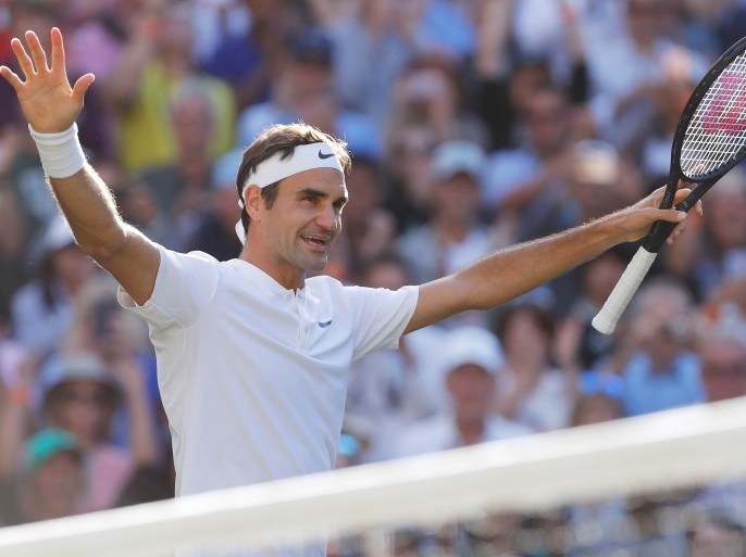 Tennis - Wimbledon - London, Britain - July 12, 2017 Switzerland’s Roger Federer celebrates winning the quarter final match against Canada’s Milos Raonic REUTERS/Andrew Couldridge