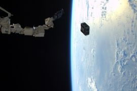 The robotic arm in Japan's Kibo laboratory successfully deploys two combined satellites from Texas universities from the International Space Station, January 29, 2016. The pair of satellites -- AggieSat4 built by Texas A&M University students, and BEVO-2 built by University of Texas students -- together form the Low Earth Orbiting Navigation Experiment for Spacecraft Testing Autonomous Rendezvous and Docking (LONESTAR) investigation. REUTERS/NASA/Tim Peake/Handout