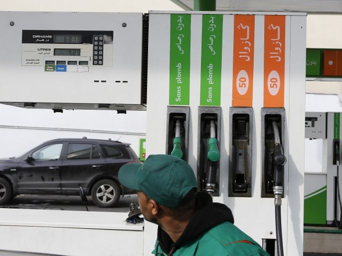 Fuel and Oil prices are seen along with the last purchase of the fuel at Ziz Filling Station in Casablanca, a billboard shows prices on MAD Moroccan dirhams per litre. Picture taken on February 3, 2016. REUTERS/Youssef Boudlal