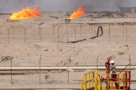 A worker adjusts a valve of an oil pipe in Zubair oilfield in Basra, Iraq July 20, 2017. REUTERS/Essam Al-Sudani