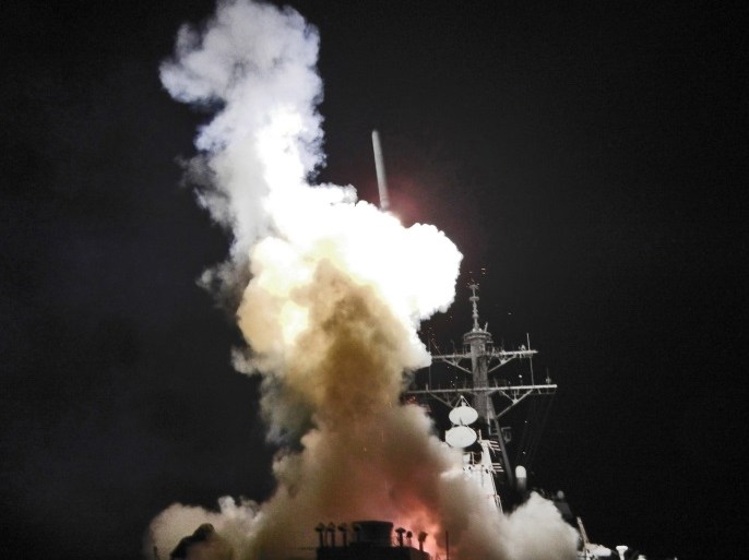 MEDITERRANEAN SEA - MARCH 19: In this handout image provided by the U.S. Navy, The USS Barry launches a Tomahawk missile in support of Operation Odyssey Dawn March 19, 2011. This was one of approximately 110 cruise missiles fired from U.S. and British ships and submarines targetting about 20 radar and anti-aircraft sites along Libya's Mediterranean coast. (Photo by Jonathan Sunderman/U.S. Navy via Getty Images)