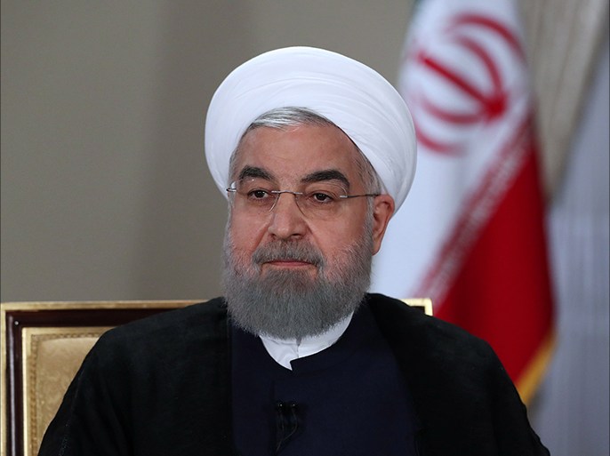 epa06170804 A handout picture made available by the presidential official website shows, Iranian President Hassan Rouhani during a live interview with Iranian National TV broadcast (IRIB) in Tehran, Iran, 29 August 2017. Media reported that Rouhani also rejected the US demands for inspecting of Iranian military sites by the UN nuclear watchdog as saying Iran was still committed to nuclear deal and International Atomic Energy Agency (IAEA) but we don't accept bullying. EPA-EFE/PRESIDENTIAL OFFICIAL WEBSITE / HANDOUT HANDOUT EDITORIAL USE ONLY/NO SALES